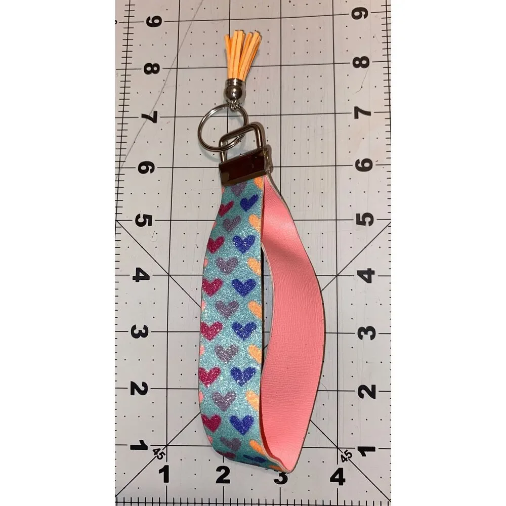 ☀️3/$9☀️ Glitter Heart Faux Leather Keychain with Orange Tassel